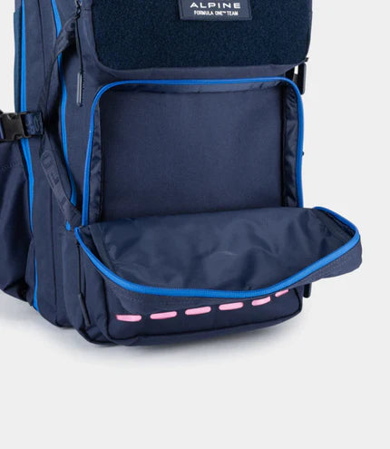 Navy backpack with blue accents and an open front pocket on a white background