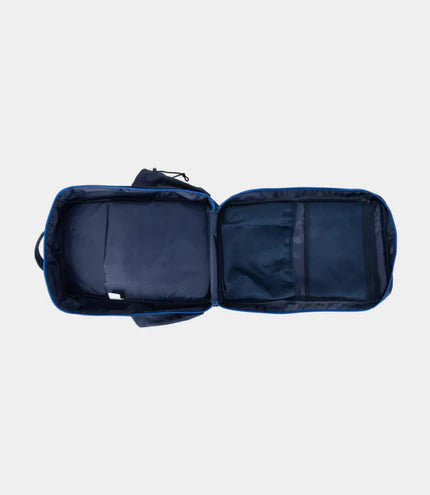Open navy blue travel bag on a light gray background