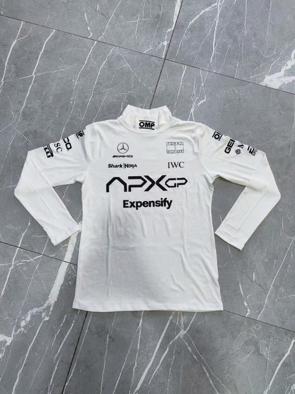 Close-up detail of the moisture-wicking fabric texture and printed APXGP logo