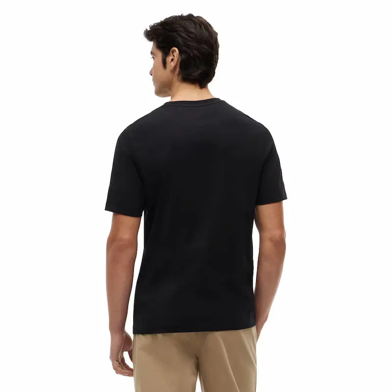 Man wearing a black t-shirt on a white background