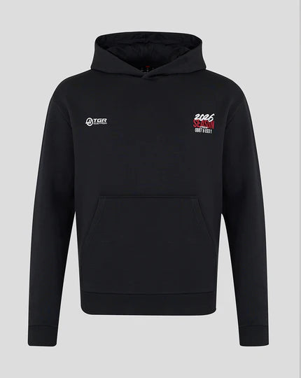 Front view of Haas F1 Team inspired unisex world tour relaxed fit hoodie in black with minimalist white and red chest logos by TassFit Performance.