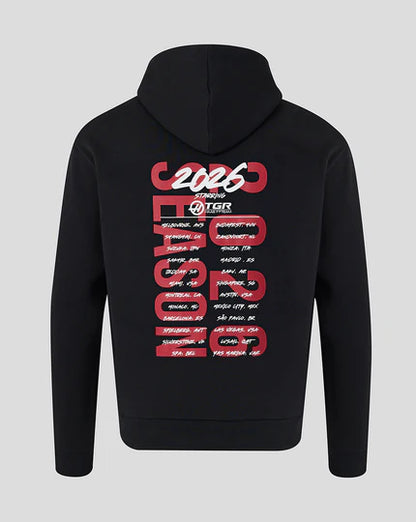 Detailed back view of the black Haas F1 inspired hoodie featuring the bold red and white 2026 season world tour race schedule graphic print
