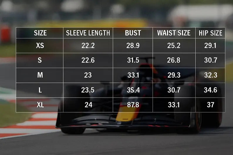 Table of clothing size measurements with a blurred Formula 1 car in the background