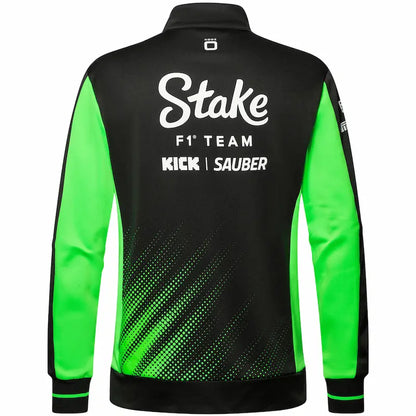 Black and green jacket with 'Stake F1 Team' and 'Kick Sauber' text on a white background
